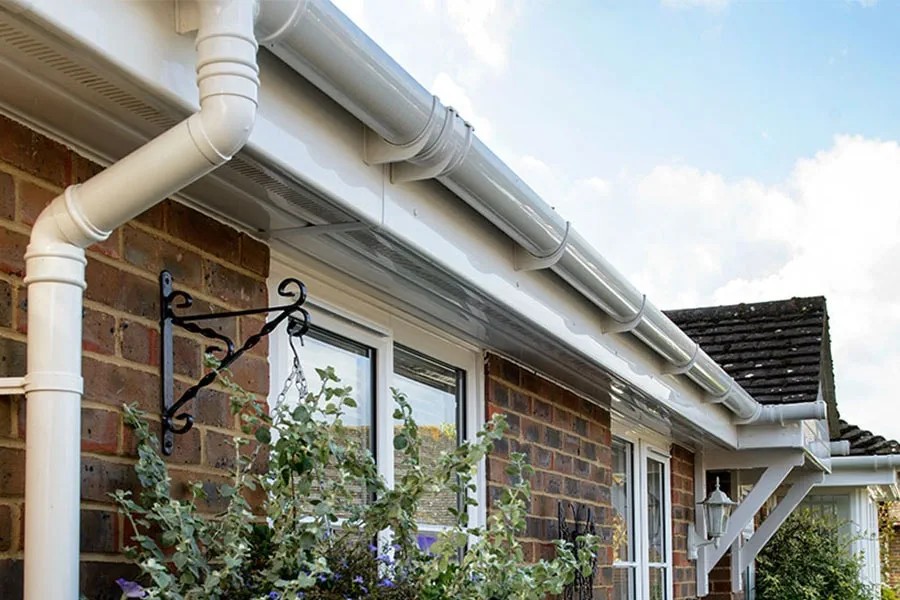 UK home showing professional guttering installation